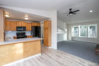 Seamless flow from dining into the living and kitchen areas.