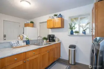Spacious kitchen in the mother-in-law suite with beautiful cabinetry and plenty of counter space.