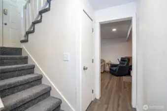 The lower-level landing provides a view into the mother-in-law suite.