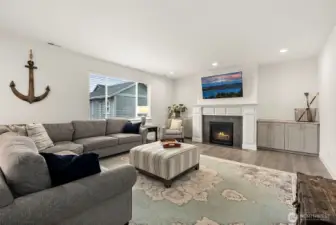 Notice the built in cabinets on either side of the gas fireplace.