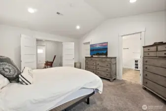 The primary bedroom has those gorgeous french doors.  It's just a lovely room!