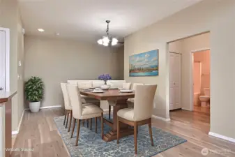 Dedicated dining space plus kitchen island seating.