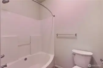 Primary shower/tub combo.