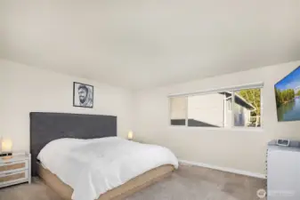 Primary bedroom with ensuite and walk in closet.