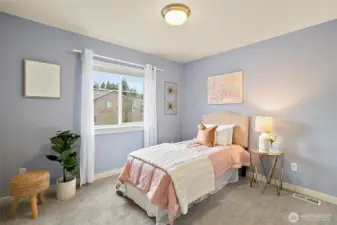 Light filled bedroom with welcoming atmosphere.