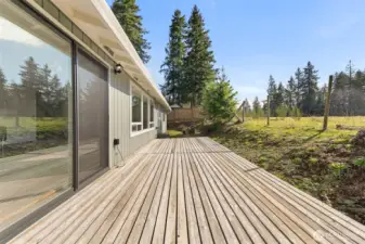 Large back deck off the kitchen has lots of room for your bbq and outdoor patio furniture