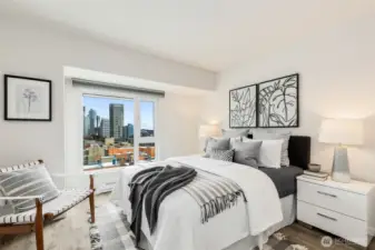 Large bedroom fit for a king size bed and the views shine day and night. A/C ports added in both bedroom and living room; 2 portable A/C units included.