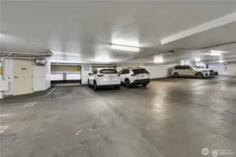 The garage is enclosed with controlled entry for safety and privacy, accessible only to residents and authorized guests. Assigned parking spot #223.