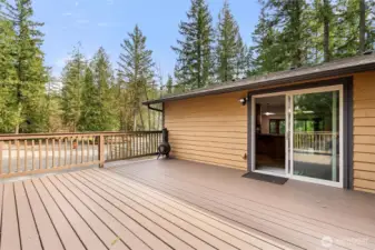 This spacious deck was built for entertaining, relaxing, and enjoying the outdoors