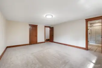 Enjoy this expansive primary suite with a clean, move-in-ready feel & direct access to a private ensuite bath