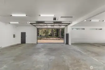 Spacious interior with roll-up door—ideal for vehicles, equipment, or projects