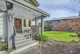 Quaint front porch with room to relax.