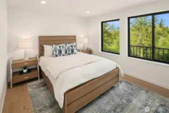 Third floor bedroom features a private en-suite bath, serene garden views, and a lspacious closet.