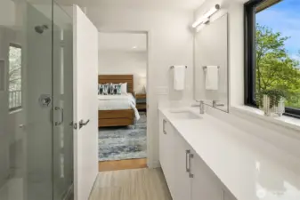 En-suite functions as a jack and jill to the hallway.