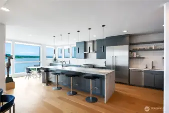 Top shelf commercial grade appliances, separate breakfast area + center island seating and storage.