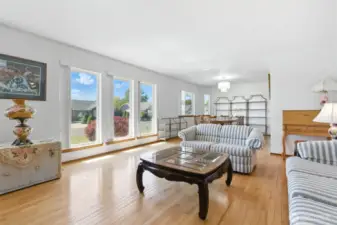 Living room with dining area in rear of picture