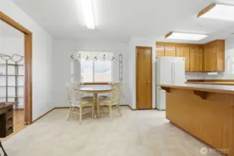 Kitchen featuring casual eating area