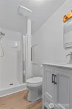 Guest bathroom adjacent to garage