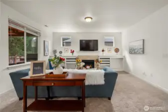 View of the second living space from the corner shows the large kitchen and outdoor living space beyond!