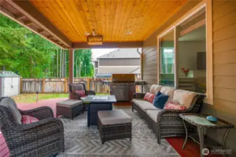 The large deck in the backyard, as seen from the kitchen door!