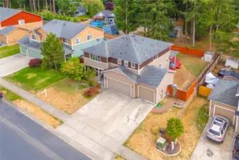 Ample parking available with this three-car garage, driveway parking for at least 3 additional vehicles, plus street parking!