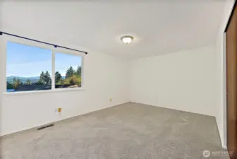 Primary bedroom has views of Mtns & Sound too!