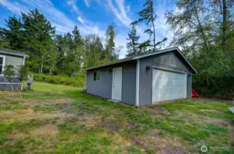 Detached Garage/Shop 24'x24' - use as a 1-car garage or turn into a workshop for whatever your hobby may be. Side entrance door plus window.