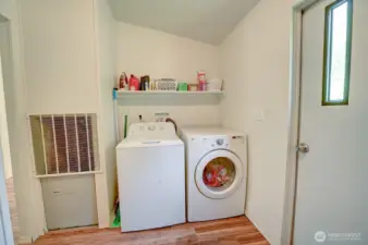 Utility room with access to backyard