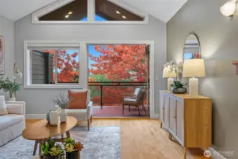 French doors open off living to beautiful mature trees with ever changing colors