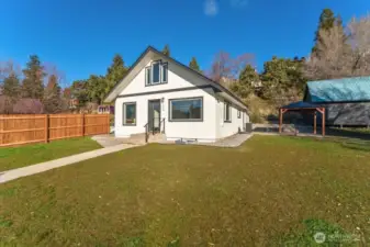 Welcome to 124 Boetzkes Ave in Manson WA!  Perched above the street, the home offers added privacy with fresh landscaping and a partially fenced yard. Recent exterior upgrades include a new roof, fresh paint, updated trim, and new siding—giving the home standout curb appeal and peace of mind.