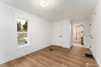 The primary bedroom includes a private en-suite bathroom for added comfort and convenience.