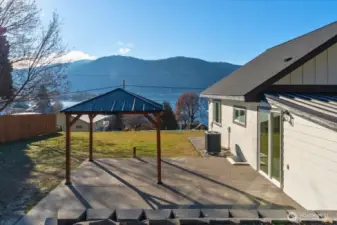 The outdoor space features a concrete patio and gazebo, already wired for a hot tub or grill—perfect for entertaining. Relax and soak in the sunrises, sunsets, and long summer days while enjoying breathtaking views of the valley.