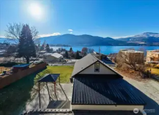 Enjoy stunning views of the lake and surrounding mountains from this home.