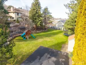 Just shy of an acre.  Lower level of the yard.  Potential to divide or add additional dwelling(s)