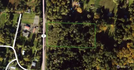 Park near the nw corner and walk down the driveway on the north side.