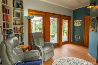 Main house floor 1 office/den with doors to west-facing deck