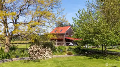 The shop/garage and apartment, seen from the main house garden