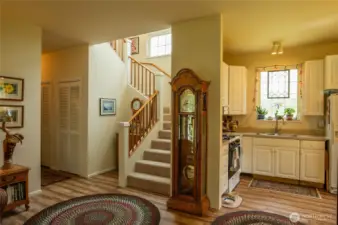 Guesthouse stairs to loft, with the hallway to the bedroom and bathroom on the left
