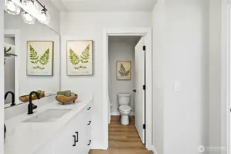 The full bath, shared between the 2 bedrooms on the upper level.