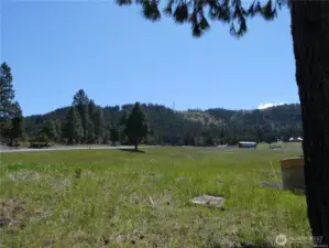 View of Sky Meadows field, clubhouse, and tower at the top of the hill, close to the property
