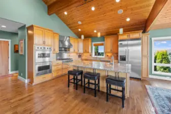 Viking Stainless Appliances, Huge Granite Island. Look at the gorgeous ceiling and distressed wood floor