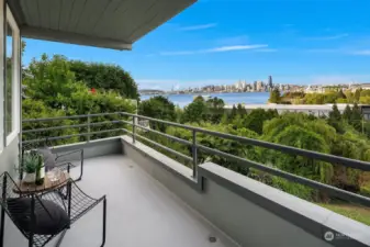 Expansive lower-level balcony with Sound and city views!
