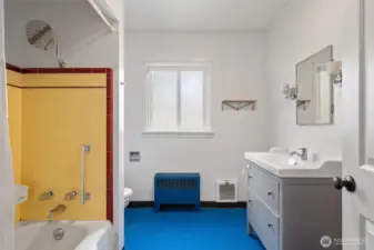 Large main floor full bathroom with new vanity