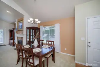 Dining conveniently close to the kitchen on the right.