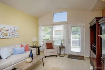 Vaulted ceilings and large windows.
