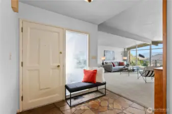 Just inside the front door.