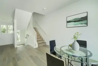 Stairs from Kitchen to Primary and Rooftop Deck