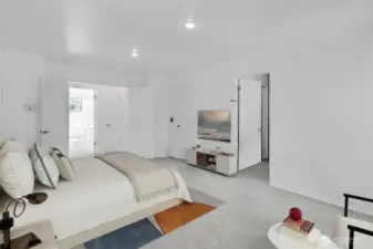 Primary Bedroom enjoys the view of the greenbelt backdrop (Virtually Staged)