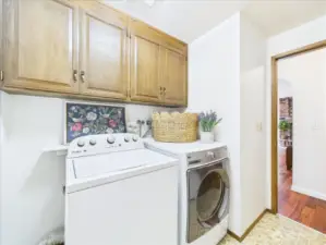 Laundry/mud room leads out to the garage.