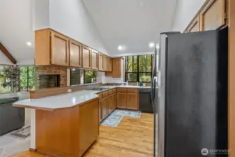 Another view of the kitchen and its proximity to the TV room